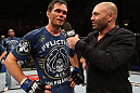 BELO HORIZONTE, BRAZIL - JUNE 23:   Rich Franklin (L) is interviewed by Joe Rogan after defeating Wanderlei Silva at Estadio Jornalista Felipe Drummond on June 23, 2012 in Belo Horizonte, Brazil.  (Photo by Josh Hedges/Zuffa LLC/Zuffa LLC via Getty Images)