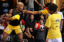 LAS VEGAS, NV - JULY 5:   Anderson Silva works out for the fans and media during the UFC 148 Open Workouts inside XS nightclub at the Encore on July 5, 2012 in Las Vegas, Nevada.  (Photo by Josh Hedges/Zuffa LLC/Zuffa LLC via Getty Images)