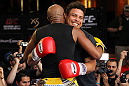 LAS VEGAS, NV - JULY 5:   (L-R) UFC Middleweight Champion Anderson Silva spars with Brazilian soccer legend Ronaldo during the UFC 148 Open Workouts inside XS nightclub at the Encore on July 5, 2012 in Las Vegas, Nevada.  (Photo by Josh Hedges/Zuffa LLC/Zuffa LLC via Getty Images)