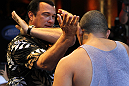 LAS VEGAS, NV - JULY 5:   Martial arts actor Steven Seagal demonstrates a technique during the UFC 148 Open Workouts inside XS nightclub at the Encore on July 5, 2012 in Las Vegas, Nevada.  (Photo by Josh Hedges/Zuffa LLC/Zuffa LLC via Getty Images)