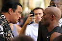 LAS VEGAS, NV - JULY 5:   (L-R) Actor Steven Seagal gives advice to Anderson Silva during the UFC 148 Open Workouts inside XS nightclub at the Encore on July 5, 2012 in Las Vegas, Nevada.  (Photo by Josh Hedges/Zuffa LLC/Zuffa LLC via Getty Images)