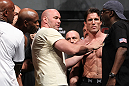 LAS VEGAS, NV - JULY 6:   UFC President Dana White separates Anderson Silva (L) and Chael Sonnen (R) during the UFC 148 Weigh In at the Mandalay Bay Events Center on July 6, 2012 in Las Vegas, Nevada.  (Photo by Josh Hedges/Zuffa LLC/Zuffa LLC via Getty Images)