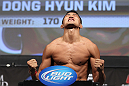 LAS VEGAS, NV - JULY 6:   Dong Hyun Kim makes weight during the UFC 148 Weigh In at the Mandalay Bay Events Center on July 6, 2012 in Las Vegas, Nevada.  (Photo by Josh Hedges/Zuffa LLC/Zuffa LLC via Getty Images)