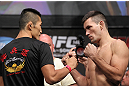 LAS VEGAS, NV - JULY 6:   (L-R) Opponents Dong Hyun Kim and Demian Maia face off during the UFC 148 Weigh In at the Mandalay Bay Events Center on July 6, 2012 in Las Vegas, Nevada.  (Photo by Josh Hedges/Zuffa LLC/Zuffa LLC via Getty Images)