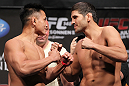 LAS VEGAS, NV - JULY 6:   (L-R) Opponents Cung Le and Patrick Cote face off during the UFC 148 Weigh In at the Mandalay Bay Events Center on July 6, 2012 in Las Vegas, Nevada.  (Photo by Josh Hedges/Zuffa LLC/Zuffa LLC via Getty Images)