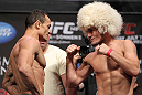 LAS VEGAS, NV - JULY 6:   (L-R) Opponents Gleison Tibau and Khabib Nurmagomedov face off during the UFC 148 Weigh In at the Mandalay Bay Events Center on July 6, 2012 in Las Vegas, Nevada.  (Photo by Josh Hedges/Zuffa LLC/Zuffa LLC via Getty Images)