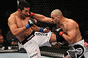 LAS VEGAS, NV - JULY 7:   (L-R) Riki Fukuda and Costa Philippou exchange strikes during their middleweight bout at UFC 148 inside MGM Grand Garden Arena on July 7, 2012 in Las Vegas, Nevada.  (Photo by Josh Hedges/Zuffa LLC/Zuffa LLC via Getty Images)  *** Local Caption *** Constantinos Philippou; Riki Fukuda