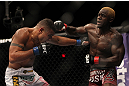 LAS VEGAS, NV - JULY 7:   Mevlin Guillard (right) punches Fabricio Camoes during their lightweight bout at UFC 148 inside MGM Grand Garden Arena on July 7, 2012 in Las Vegas, Nevada.  (Photo by Josh Hedges/Zuffa LLC/Zuffa LLC via Getty Images)  *** Local Caption *** Melvin Guillard; Fabricio Camoes