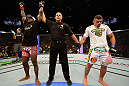 LAS VEGAS, NV - JULY 7:   Melvin Guillard (left) is declared the winner in his fight against Fabricio Camoes (right) during UFC 148 inside MGM Grand Garden Arena on July 7, 2012 in Las Vegas, Nevada.  (Photo by Donald Miralle/Zuffa LLC/Zuffa LLC via Getty Images)  *** Local Caption *** Melvin Guillard; Fabricio Camoes