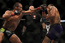 LAS VEGAS, NV - JULY 7:   (L-R) Ivan Menjivar punches Mike Easton during their bantamweight bout at UFC 148 inside MGM Grand Garden Arena on July 7, 2012 in Las Vegas, Nevada.  (Photo by Josh Hedges/Zuffa LLC/Zuffa LLC via Getty Images)  *** Local Caption *** Ivan Menjivar; Mike Easton