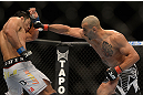 LAS VEGAS, NV - JULY 7:   (R-L) Costa Philippou punches Riki Fukuda during their middleweight bout at UFC 148 inside MGM Grand Garden Arena on July 7, 2012 in Las Vegas, Nevada.  (Photo by Josh Hedges/Zuffa LLC/Zuffa LLC via Getty Images)  *** Local Caption *** Constantinos Philippou; Riki Fukuda