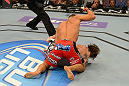 LAS VEGAS, NV - JULY 7:   Chad Mendes attempts to finish Cody McKenzie during their featherweight bout at UFC 148 inside MGM Grand Garden Arena on July 7, 2012 in Las Vegas, Nevada.  (Photo by Donald Miralle/Zuffa LLC/Zuffa LLC via Getty Images)  *** Local Caption *** Chad Mendes; Cody McKenzie