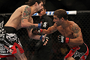 LAS VEGAS, NV - JULY 7:   (R-L) Chad Mendes punches Cody McKenzie during their featherweight bout at UFC 148 inside MGM Grand Garden Arena on July 7, 2012 in Las Vegas, Nevada.  (Photo by Josh Hedges/Zuffa LLC/Zuffa LLC via Getty Images)  *** Local Caption *** Chad Mendes; Cody McKenzie