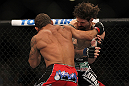 LAS VEGAS, NV - JULY 7:   (L-R) Chad Mendes punches Cody McKenzie during their featherweight bout at UFC 148 inside MGM Grand Garden Arena on July 7, 2012 in Las Vegas, Nevada. (Photo by Josh Hedges/Zuffa LLC/Zuffa LLC via Getty Images)  *** Local Caption *** Chad Mendes; Cody McKenzie