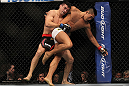 LAS VEGAS, NV - JULY 7:   Demian Maia (left) wrestles Dong Hyun Kim during their welterweight bout at UFC 148 inside MGM Grand Garden Arena on July 7, 2012 in Las Vegas, Nevada.  (Photo by Josh Hedges/Zuffa LLC/Zuffa LLC via Getty Images)  *** Local Caption *** Demian Maia; Dong Hyun Kim