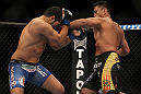 LAS VEGAS, NV - JULY 7:   (R-L) Cung Le punches Patrick Cote during their middleweight bout at UFC 148 inside MGM Grand Garden Arena on July 7, 2012 in Las Vegas, Nevada.  (Photo by Josh Hedges/Zuffa LLC/Zuffa LLC via Getty Images)  *** Local Caption *** Cung Le; Patrick Cote