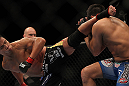 LAS VEGAS, NV - JULY 7:   Cung Le (left) kicks Patrick Cote during their middleweight bout at UFC 148 inside MGM Grand Garden Arena on July 7, 2012 in Las Vegas, Nevada.  (Photo by Josh Hedges/Zuffa LLC/Zuffa LLC via Getty Images)  *** Local Caption *** Cung Le; Patrick Cote