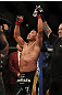 LAS VEGAS, NV - JULY 7:   Cung Le reacts to being declared the winner in his fight with Patrick Cote after their middleweight bout at UFC 148 inside MGM Grand Garden Arena on July 7, 2012 in Las Vegas, Nevada.  (Photo by Josh Hedges/Zuffa LLC/Zuffa LLC via Getty Images)  *** Local Caption *** Cung Le; Patrick Cote