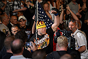 LAS VEGAS, NV - JULY 7:   Tito Ortiz walks to the Octagon before his light heavyweight bout with Forrest Griffin at UFC 148 inside MGM Grand Garden Arena on July 7, 2012 in Las Vegas, Nevada.  (Photo by Donald Miralle/Zuffa LLC/Zuffa LLC via Getty Images)  *** Local Caption *** Tito Ortiz