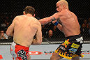 LAS VEGAS, NV - JULY 7:   (R-L) Tito Ortiz punches Forrest Griffin during their light heavyweight bout at UFC 148 inside MGM Grand Garden Arena on July 7, 2012 in Las Vegas, Nevada.  (Photo by Donald Miralle/Zuffa LLC/Zuffa LLC via Getty Images)  *** Local Caption *** Tito Ortiz; Forrest Griffin