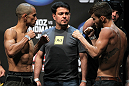 SAN JOSE, CA - JULY 10:   (L-R) Opponents Chris Cariaso and Josh Ferguson face off during the UFC on Fuel TV weigh in at HP Pavilion on July 10, 2012 in San Jose, California.  (Photo by Josh Hedges/Zuffa LLC/Zuffa LLC via Getty Images)