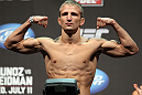 SAN JOSE, CA - JULY 10:   T.J. Dillashaw makes weight during the UFC on Fuel TV weigh in at HP Pavilion on July 10, 2012 in San Jose, California.  (Photo by Josh Hedges/Zuffa LLC/Zuffa LLC via Getty Images)