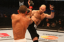 SAN JOSE, CA - JULY 11:   (R-L) Dan Stittgen kicks Marcelo Guimaraes during their welterweight bout at HP Pavilion on July 11, 2012 in San Jose, California.  (Photo by Ezra Shaw/Zuffa LLC/Zuffa LLC via Getty Images)  *** Local Caption *** Marcelo Guimaraes; Dan Stittgen