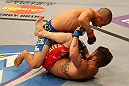 SAN JOSE, CA - JULY 11:   Chris Cariaso (top) punches Josh Ferguson during their flyweight bout at HP Pavilion on July 11, 2012 in San Jose, California.  (Photo by Ezra Shaw/Zuffa LLC/Zuffa LLC via Getty Images)  *** Local Caption *** Chris Cariaso; Josh Ferguson