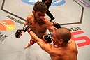 SAN JOSE, CA - JULY 11:   (L-R) Josh Ferguson punches Chris Cariaso during their flyweight bout at HP Pavilion on July 11, 2012 in San Jose, California.  (Photo by Ezra Shaw/Zuffa LLC/Zuffa LLC via Getty Images)  *** Local Caption *** Chris Cariaso; Josh Ferguson