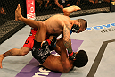 SAN JOSE, CA - JULY 11:   Damacio Page (top) punches Alex Caceres during their bantamweight bout at HP Pavilion on July 11, 2012 in San Jose, California.  (Photo by Ezra Shaw/Zuffa LLC/Zuffa LLC via Getty Images)  *** Local Caption *** Damacio Page; Alex Caceres