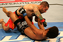 SAN JOSE, CA - JULY 11:   Damacio Page (top) punches Alex Caceres during their bantamweight bout at HP Pavilion on July 11, 2012 in San Jose, California.  (Photo by Ezra Shaw/Zuffa LLC/Zuffa LLC via Getty Images)  *** Local Caption *** Damacio Page; Alex Caceres