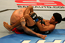 SAN JOSE, CA - JULY 11:   Alex Caceres (right) attempts to submit Damacio Page during their bantamweight bout at HP Pavilion on July 11, 2012 in San Jose, California.  (Photo by Ezra Shaw/Zuffa LLC/Zuffa LLC via Getty Images)  *** Local Caption *** Damacio Page; Alex Caceres