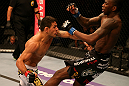 SAN JOSE, CA - JULY 11:   (L-R) Rafael dos Anjos punches Anthony Njokuani during their lightweight bout at HP Pavilion on July 11, 2012 in San Jose, California.  (Photo by Ezra Shaw/Zuffa LLC/Zuffa LLC via Getty Images)  *** Local Caption *** Rafael Dos Anjos; Anthony Njokuani