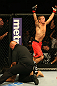 SAN JOSE, CA - JULY 11:   TJ Dillashaw (red shorts) reacts to his submission victory over Vaughan Lee after their bantamweight bout at HP Pavilion on July 11, 2012 in San Jose, California.  (Photo by Ezra Shaw/Zuffa LLC/Zuffa LLC via Getty Images)  *** Local Caption *** T.J. Dillashaw