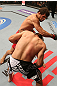 SAN JOSE, CA - JULY 11:   Aaron Simpson (top) punches Kenny Robertson during their welterweight bout at HP Pavilion on July 11, 2012 in San Jose, California.  (Photo by Ezra Shaw/Zuffa LLC/Zuffa LLC via Getty Images)  *** Local Caption *** Aaron Simpson; Kenny Robertson