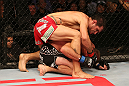 SAN JOSE, CA - JULY 11:   Aaron Simpson (red shorts) punches Kenny Robertson during their welterweight bout at HP Pavilion on July 11, 2012 in San Jose, California.  (Photo by Ezra Shaw/Zuffa LLC/Zuffa LLC via Getty Images)  *** Local Caption *** Aaron Simpson; Kenny Robertson