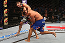 SAN JOSE, CA - JULY 11:   (R-L) Mark Munoz punches Chris Weidman during their middleweight bout at HP Pavilion on July 11, 2012 in San Jose, California.  (Photo by Ezra Shaw/Zuffa LLC/Zuffa LLC via Getty Images)  *** Local Caption *** Mark Munoz; Chris Weidman