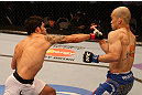 SAN JOSE, CA - JULY 11:   (L-R) Raphael Assuncao punches Issei Tamura during their bantamweight bout at HP Pavilion on July 11, 2012 in San Jose, California.  (Photo by Ezra Shaw/Zuffa LLC/Zuffa LLC via Getty Images)  *** Local Caption *** Issei Tamura; Raphael Assuncao