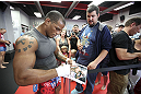 CALGARY, CANADA - JULY 18: Hector Lombard signs autographs after he works out for the fans and media during the UFC 149 Open Workouts inside Champion's Creed Gym on July 18, 2012 in Calgary, Alberta, Canada.  (Photo by Jeff Bottari/Zuffa LLC/Zuffa LLC via Getty Images)