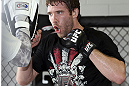 CALGARY, CANADA - JULY 18:  Mitch Clarke works out for the fans and media during the UFC 149 Open Workouts inside Champion's Creed Gym on July 18, 2012 in Calgary, Alberta, Canada.  (Photo by Jeff Bottari/Zuffa LLC/Zuffa LLC via Getty Images)