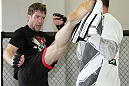 CALGARY, CANADA - JULY 18:  Mitch Clarke works out for the fans and media during the UFC 149 Open Workouts inside Champion's Creed Gym on July 18, 2012 in Calgary, Alberta, Canada.  (Photo by Jeff Bottari/Zuffa LLC/Zuffa LLC via Getty Images)