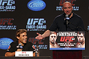 CALGARY, CANADA - JULY 19: Urijah Faber and UFC President Dana White share a moment on stage at the UFC 149 press conference at the Flames Central Sports Club on July 19, 2012 in Calgary, Alberta, Canada. (Photo by Jeff Bottari/Zuffa LLC/Zuffa LLC via Getty Images)