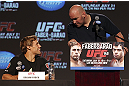 CALGARY, CANADA - JULY 19: Urijah Faber and UFC President Dana White share a moment on stage at the UFC 149 press conference at the Flames Central Sports Club on July 19, 2012 in Calgary, Alberta, Canada. (Photo by Jeff Bottari/Zuffa LLC/Zuffa LLC via Getty Images)