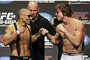 CALGARY, CANADA - JULY 20:  Chris Clements and Matthew Riddle face off at the UFC 149 weigh-in at the Scotiabank Saddledome on July 20, 2012 in Calgary, Alberta, Canada.  (Photo by Jeff Bottari/Zuffa LLC/Zuffa LLC via Getty Images)