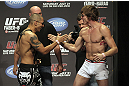 CALGARY, CANADA - JULY 20:  Chris Clements and Matthew Riddle face off at the UFC 149 weigh-in at the Scotiabank Saddledome on July 20, 2012 in Calgary, Alberta, Canada.  (Photo by Jeff Bottari/Zuffa LLC/Zuffa LLC via Getty Images)