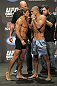 CALGARY, CANADA - JULY 20: Urijah Faber and Renan Barao square off at the UFC 149 weigh-in at the Scotiabank Saddledome on July 20, 2012 in Calgary, Alberta, Canada. (Photo by Jeff Bottari/Zuffa LLC/Zuffa LLC via Getty Images)