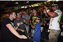 CALGARY, CANADA - JULY 20:  Michael Bisping poses for pictures after a Q&A session with the fans prior to the UFC 149 weigh-in at the Scotiabank Saddledome on July 20, 2012 in Calgary, Alberta, Canada.  (Photo by Jeff Bottari/Zuffa LLC/Zuffa LLC via Getty Images)