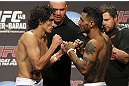 CALGARY, CANADA - JULY 20: Roland Delorme and Francisco Rivera face off at the UFC 149 weigh-in at the Scotiabank Saddledome on July 20, 2012 in Calgary, Alberta, Canada.  (Photo by Jeff Bottari/Zuffa LLC/Zuffa LLC via Getty Images)