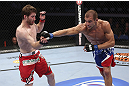 CALGARY, CANADA - JULY 21:  (R-L) Anton Kuivanen throws a punch at Mitch Clarke during their lightweight bout at UFC 149 inside the Scotiabank Saddledome on July 21, 2012 in Calgary, Alberta, Canada.  (Photo by Nick Laham/Zuffa LLC/Zuffa LLC via Getty Images)