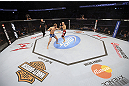 CALGARY, CANADA - JULY 21: (L-R) Bryan Caraway throws a punch at Mitch Gagnon during their bantamweight bout at UFC 149 inside the Scotiabank Saddledome on July 21, 2012 in Calgary, Alberta, Canada.  (Photo by Nick Laham/Zuffa LLC/Zuffa LLC via Getty Images)